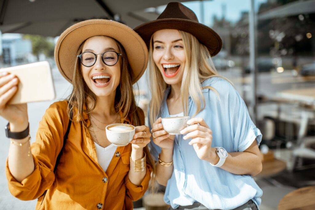 Taking a selfie with coffee for International Coffee Day